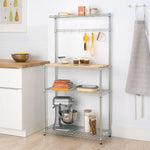 Heavy-Duty Baker's Rack with wood top, featuring storage shelves and kitchen appliances, ideal for organization.