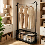 Freestanding Clothes Rack with dresses hanging and storage boxes, ideal for organizing spaces in South African homes.
