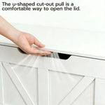 Person using the u-shaped cut-out pull on a Rustic Wooden Storage bench lid for easy access.