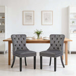 Dining Chairs Set of 2 tufted velvet button-back with nailhead trim in elegant dining room setting.