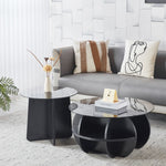 Modern Glass Nesting Coffee Table set placed in a stylish living room with decorative elements and a cozy sofa.