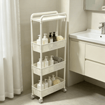 4-Tier Rolling Storage Cart in a bathroom, featuring clean white design, holding bottles and towels.