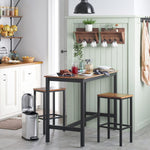Bar Table and Stools Set with rustic industrial design in a stylish kitchen setting.
