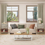 Modern LED Pedestal with Open Shelf - Set of 2 placed beside a stylish couch in a well-lit living room.