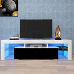 Front view of white and black TV console with blue LED lighting