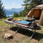 Heavy-Duty Portable Folding Camping Stretcher with sleeping gear in a scenic outdoor setting