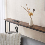 Narrow Sofa Table with Charging Station displaying a minimalist design, power outlets, and a decorative vase.