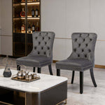 Dining Chairs Set of 2 tufted velvet button-back chairs with nailhead trim in a modern dining room setting.