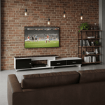 Modern living room featuring an Extendable TV Stand with storage, showcasing a TV and stylish decor.