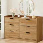 6-Drawer Chest of Drawers in a modern setting with a mirror and decor pieces, showcasing its elegant design.
