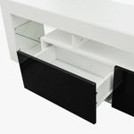 Modern Floating LED TV Stand with sleek design and open shelves, showcasing drawers in high-gloss black and white finish.