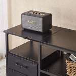 TV Stand with Charging Station featuring a black speaker on top, showcasing modern design and functionality.