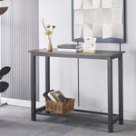Console Table with rustic wooden top and black metal frame, showcasing a modern entryway setup.