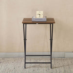 Rustic folding TV tray table with clock and books on a minimalistic background.