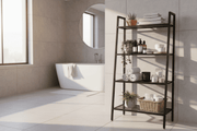 Black 4-tier ladder shelf styled in South African bathroom with towels and plants - best ladder shelf SA | Artisan SA