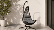 Stylish swing chair South Africa ideal for minimalist relaxation, featuring a cozy cushion and modern design.