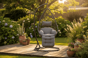 Grey rattan egg hanging chair on a South African garden patio - ArtisanSA