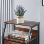Wooden side table with a vase of flowers and books on a white wall background