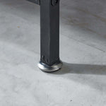 Metal leg with circular base on concrete floor - storage cabinet 9 drawers OT-117 hardware detail | Artisansa SA