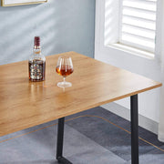 150cm office desk workstation featuring a wooden surface with a glass of beverage and a bottle.