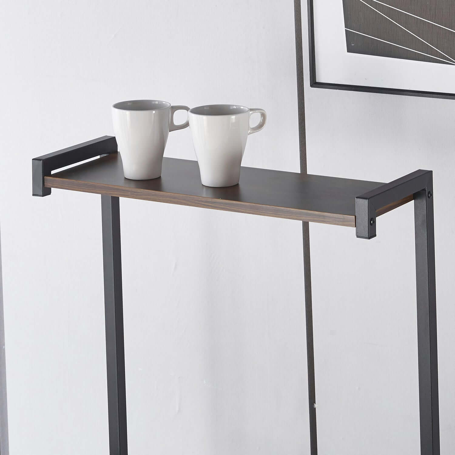 Kitchen Baker's Rack with two white mugs on the top shelf, showcasing a modern coffee station.