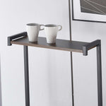 Kitchen Baker's Rack with two white mugs on the top shelf, showcasing a modern coffee station.
