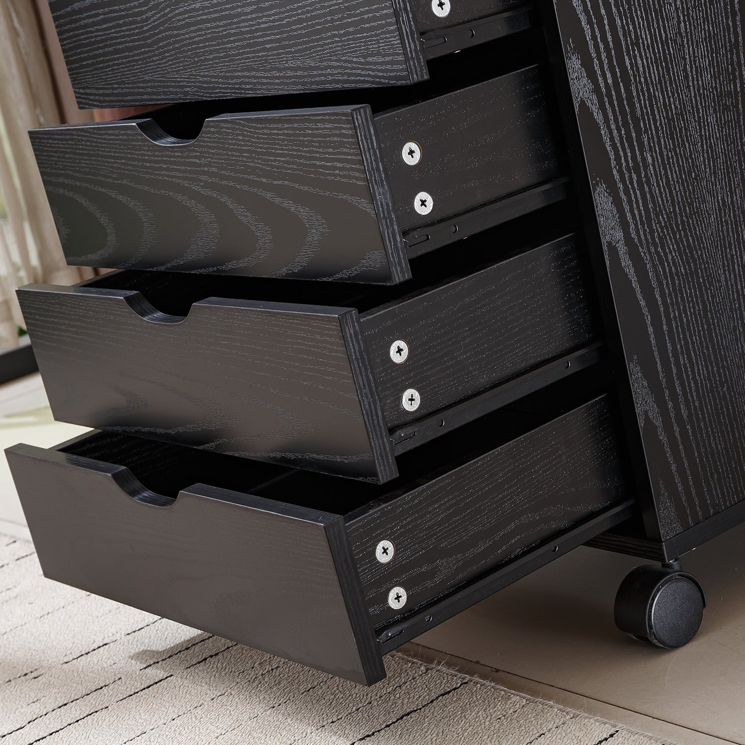 Black Bedside Table with Drawers featuring multiple open drawers for convenient storage solutions.