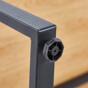 Close-up of corner joint of a 150cm office desk workstation showing durable construction and adjustable feet.