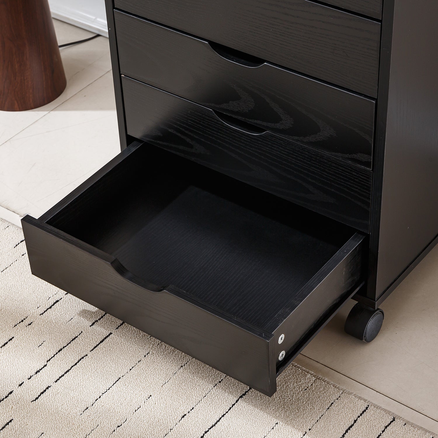 Black Bedside Table with Drawers featuring an open drawer for easy access and storage.