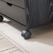 Close-up of Black Bedside Table with Drawers on wheels, showcasing its stylish design and functional storage.