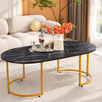 120cm oval coffee table with styled decorative accessories