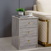 Modern 3-Drawer Side Table BST-01 with grey finish and gold accents beside a cream sofa.