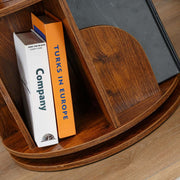 Space-saving 2-tier rotating bookshelf fully loaded with books in living room