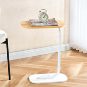 Modern Two-Tone End Table OT-106 with magazine and clock, showcasing a contemporary design in a bright room.