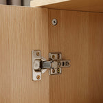 Close-up of the hinge detail on the Arched Rattan Shoe Cabinet, showcasing its modern design and quality hardware.
