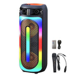 A colorful wireless Bluetooth speaker with a microphone, LED lights, and a remote control. The speaker is black with vibrant multicolored lights, and it comes with a wired microphone and a USB charging cable.