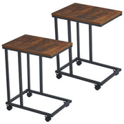 Two wooden tables with metal frames on wheels on a white background| Artisansa SA