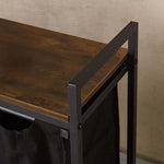3-Compartment Laundry Sorter with Wood Shelf showing a close-up of the wood top and metal frame.