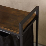 3-Compartment Laundry Sorter with Wood Shelf showing a close-up of the wood top and metal frame.