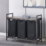 3-Compartment Laundry Sorter with Wood Shelf in a modern laundry room, featuring three fabric compartments for organizing laundry.