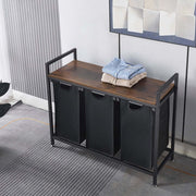 3-Compartment Laundry Sorter with Wood Shelf featuring industrial design and fabric bins for organizing laundry.