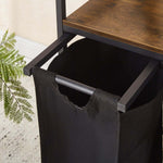 3-Compartment Laundry Sorter with Wood Shelf showcasing the black hamper fabric and sturdy metal frame.