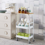3-Tier Rolling Storage Cart with Wood Top displaying various bottles and jars on a stylish kitchen countertop.