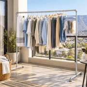 Retail garment display rack with durable double rail design for clothing shops