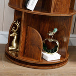 Bottom tier of rotating bookshelf used for displaying elegant home decor