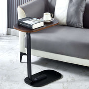 Modern Two-Tone End Table OT-106 placed beside a sofa with a book and a cup on top.