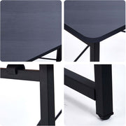 Close-up details of the Minimalist Computer Desk with X-Frame Design showcasing modern aesthetics and sturdy construction.