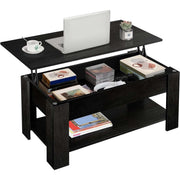 Black lift-top coffee table with various items on a white background | Artisansa SA