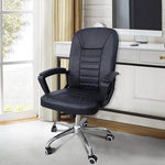 Ergonomic Executive Office Chair BX124 placed in a bright office setting with natural light.