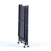 Mobile Kitchen Shelf folded and on wheels for easy transport and storage.